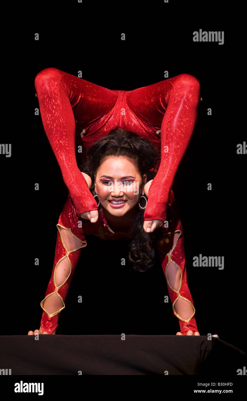 FEMALE CONTORTIONIST at a DALAI LAMA teaching sponsored by KUMBUM CHAMTSE LING the TIBETAN CULTURAL CENTER BLOOMINGTON INDIANA Stock Photo