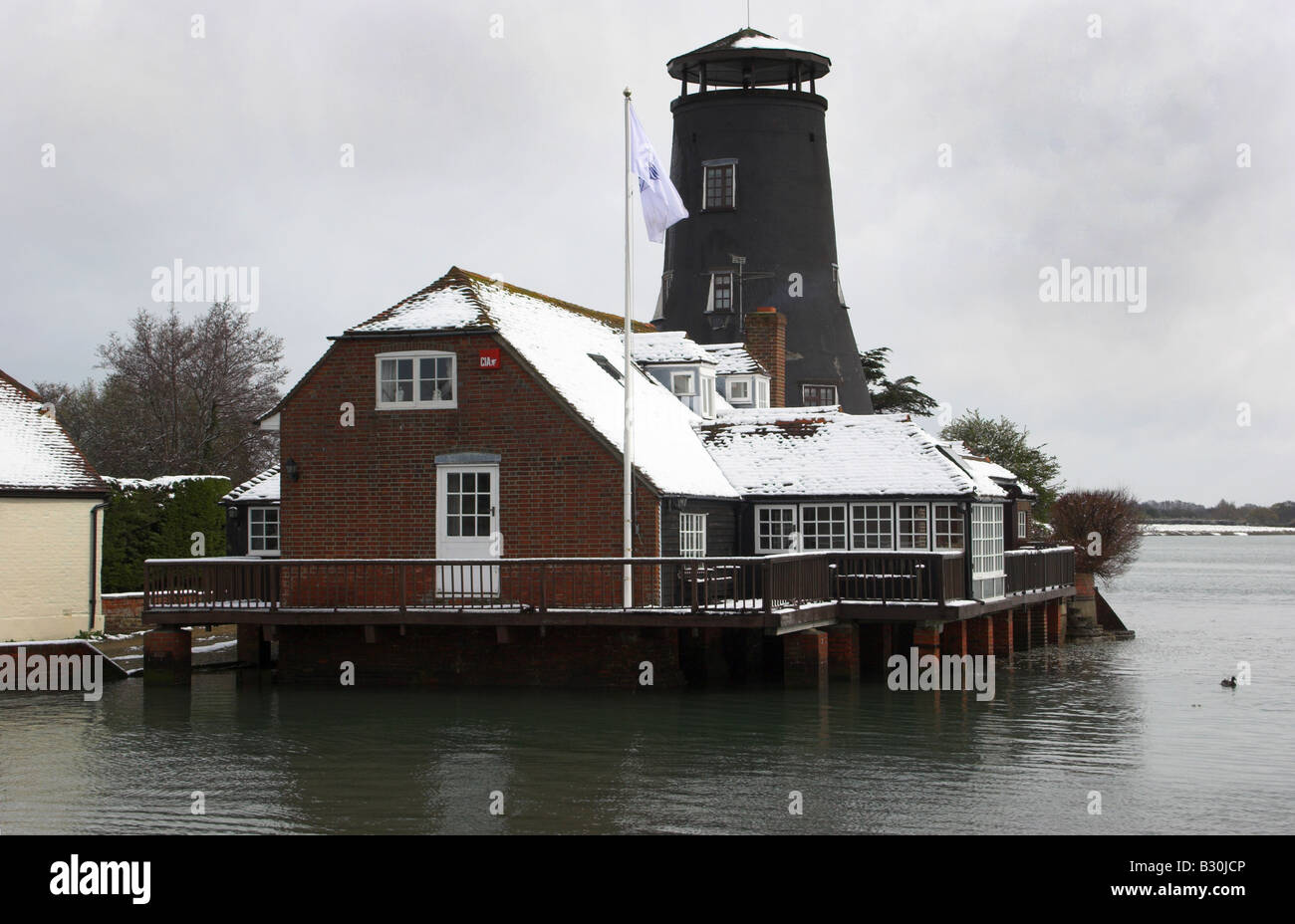 The Mill in the snow, Langstone Stock Photo