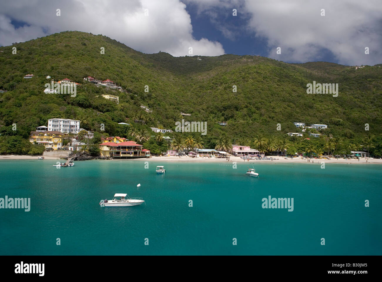 The long beautiful beach at Cane Garden Bay on the island of Tortola in the British Virgin Islands. Stock Photo