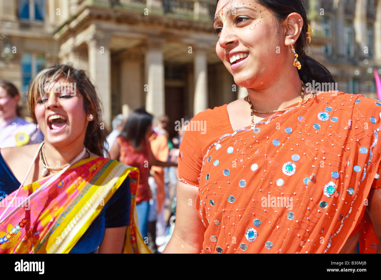 Dancing women at the festival of Rathayatra celebrated in Birmingham United Kingdom Stock Photo