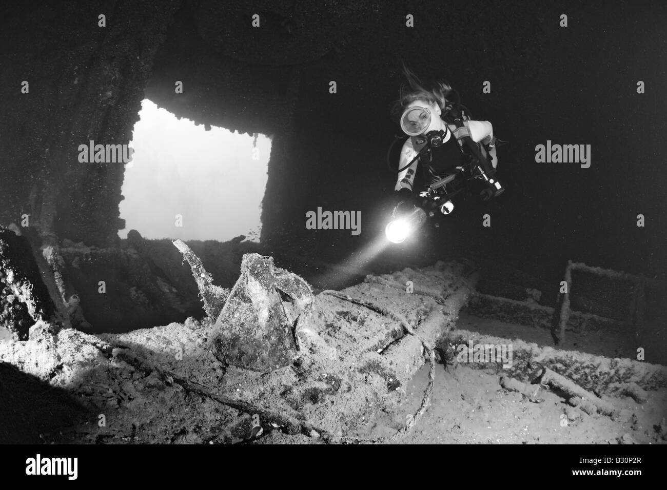 Diver discover Teapot inside of HIJMS Nagato Battleship Marshall Islands Bikini Atoll Micronesia Pacific Ocean Stock Photo