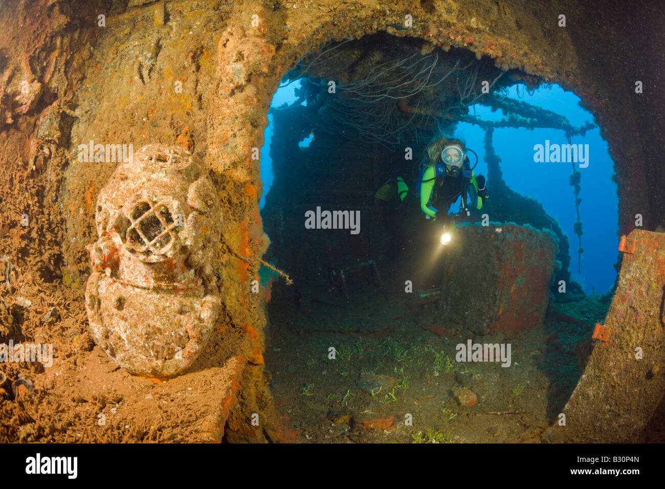 Diver discover Diving Helmet on Brigde of USS Saratoga Marshall Islands Bikini Atoll Micronesia Pacific Ocean Stock Photo