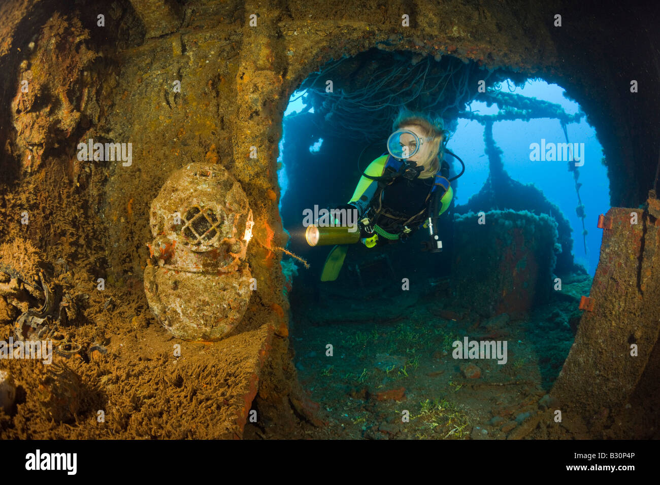 Diver discover Diving Helmet on Brigde of USS Saratoga Marshall Islands Bikini Atoll Micronesia Pacific Ocean Stock Photo
