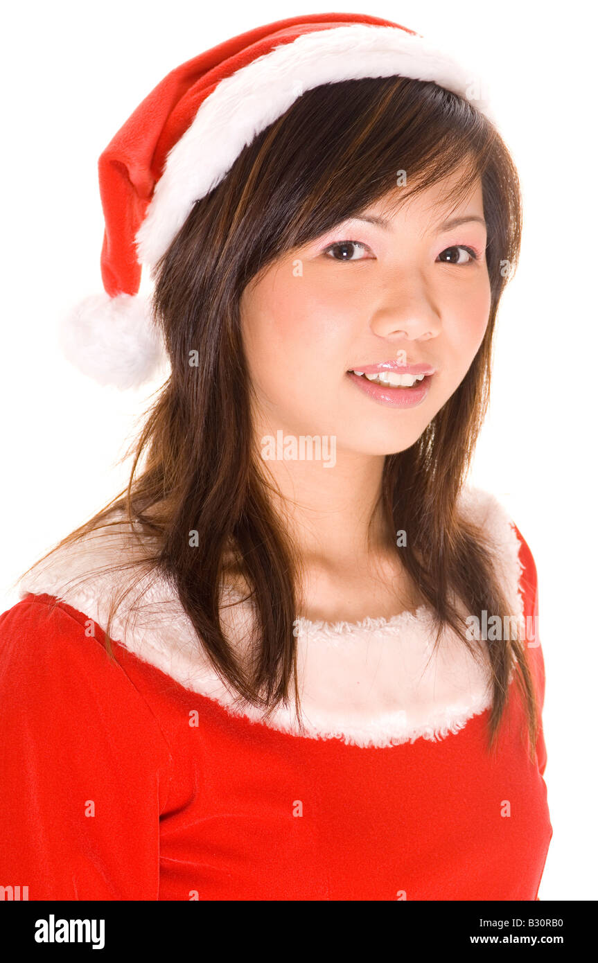 A cute young asian woman in a santa costume Stock Photo - Alamy