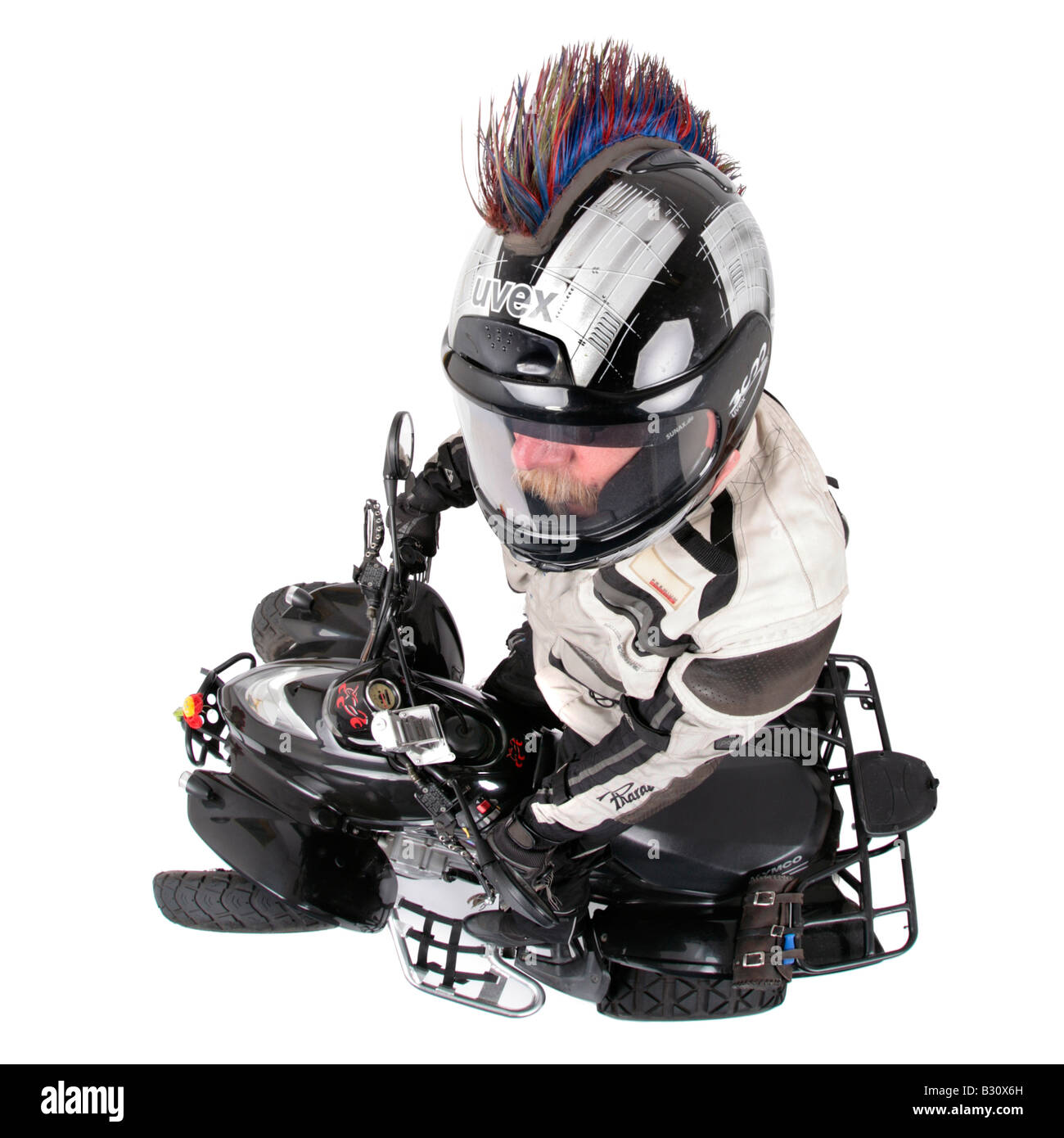 quod biker with helmet and vehicle Stock Photo