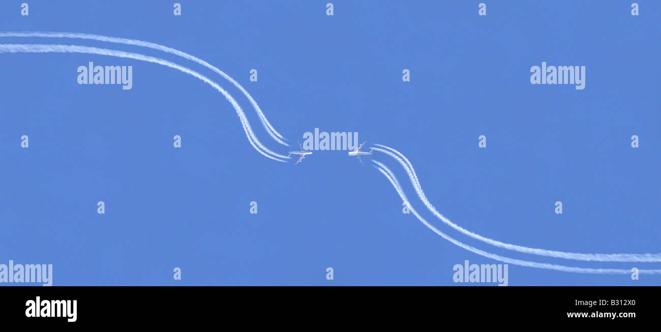 airplanes on collision course, change maneuver Stock Photo