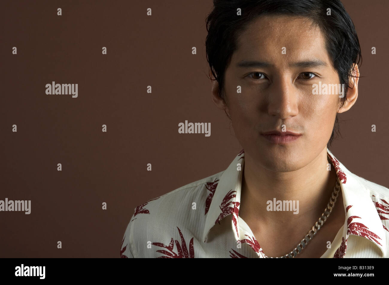 A male asian model in a casual shirt Stock Photo - Alamy
