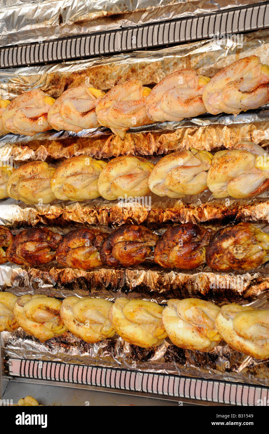 ROASTING CHICKENS ON ROTISSERIE Stock Photo Alamy