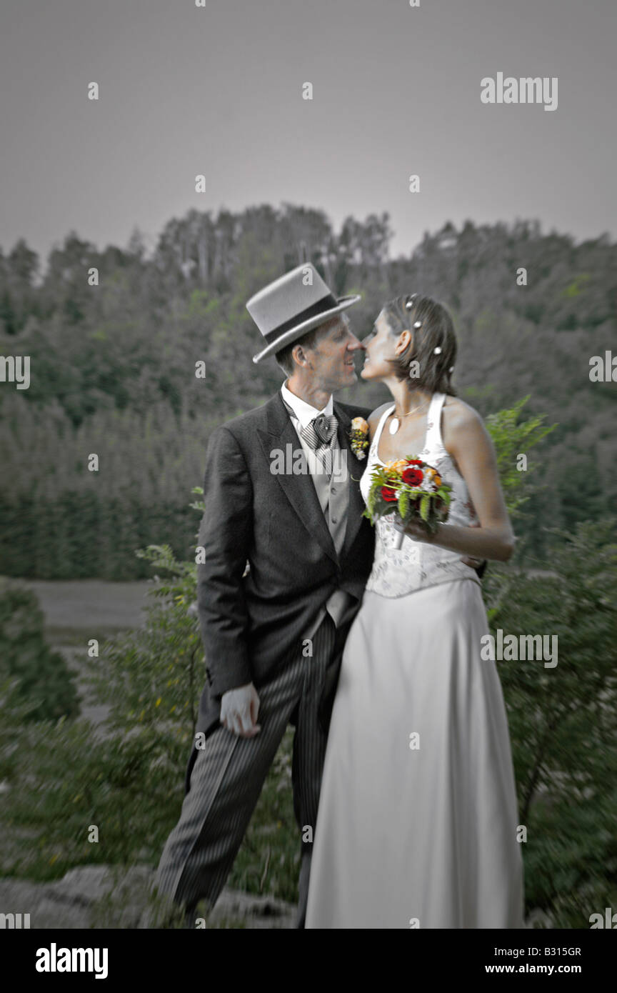 bridal couple kisses itself Stock Photo