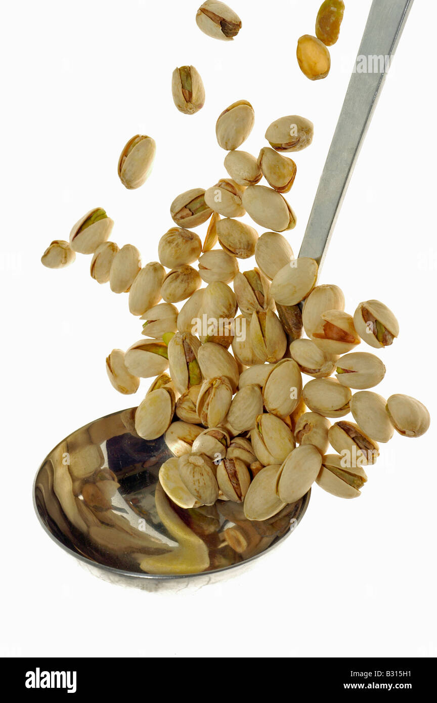 Pistachios (Pistacia vera, the 'Green almond') in a drawing spoon Stock Photo