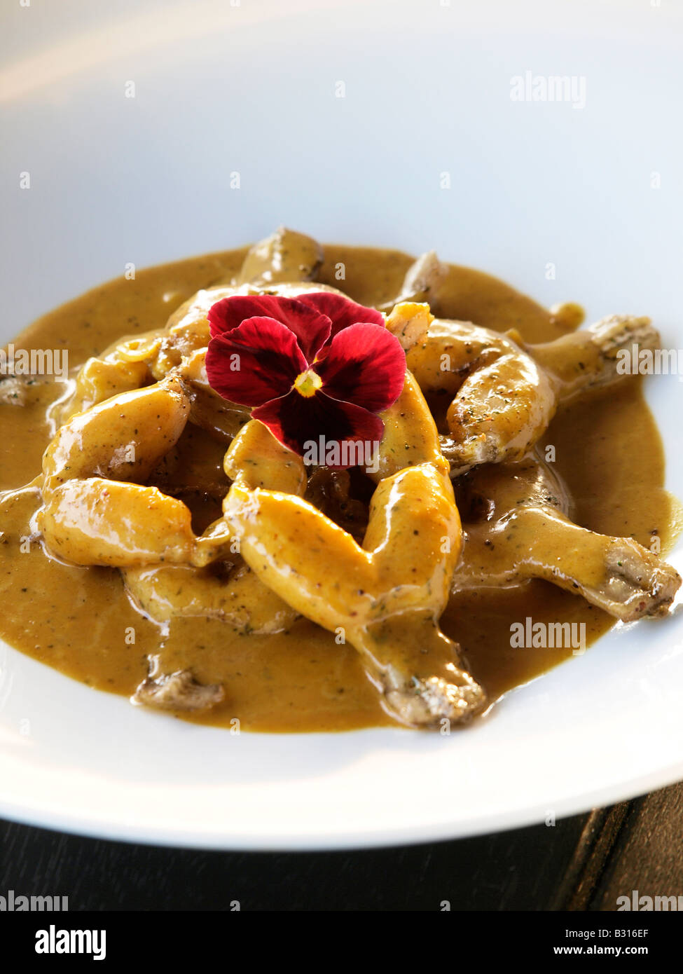 Frog legs are considered a delicacy in French cuisine Stock Photo - Alamy