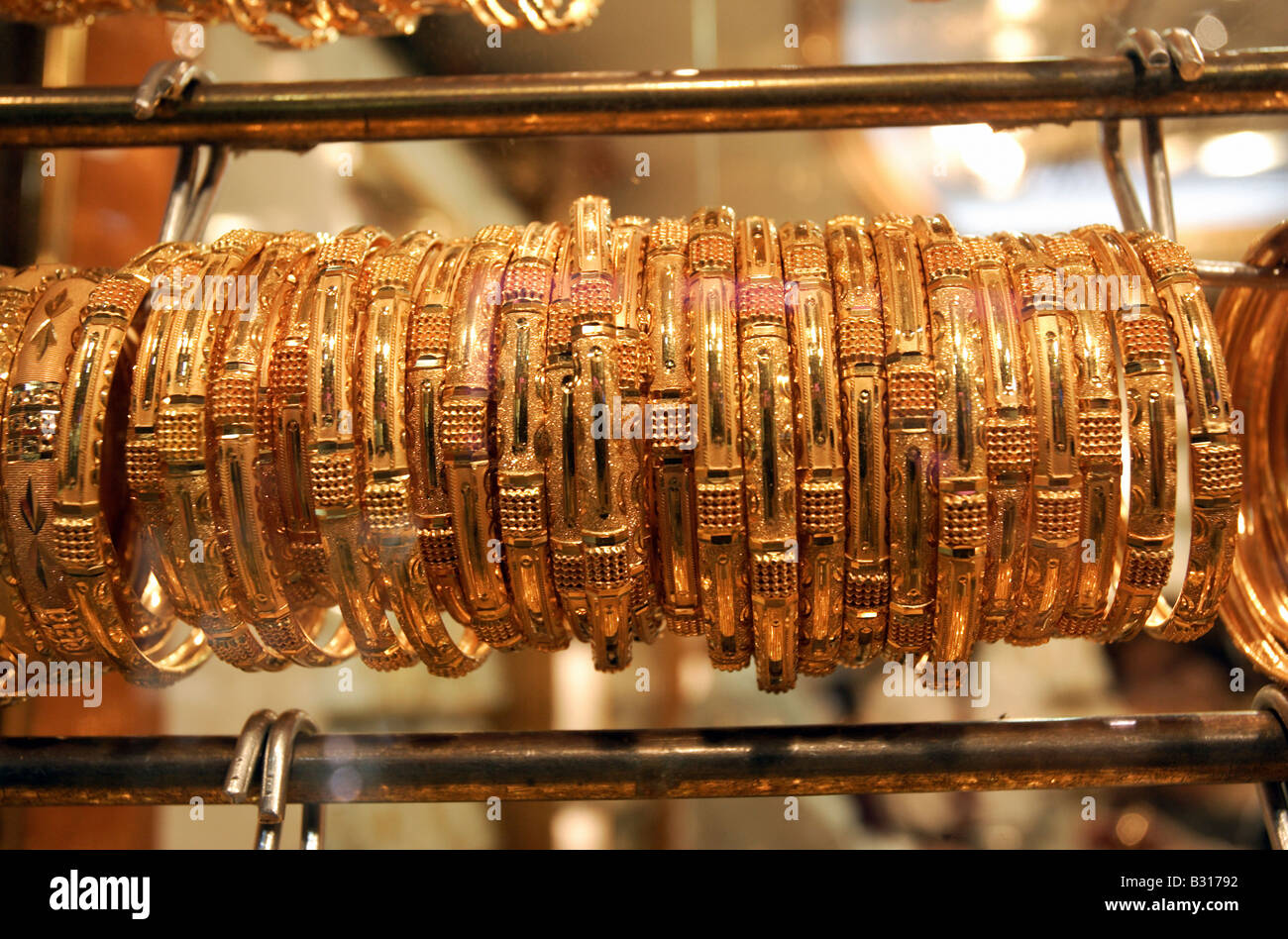Golden bracelets hanging a rack, Dubai, United Arab Emirates Stock
