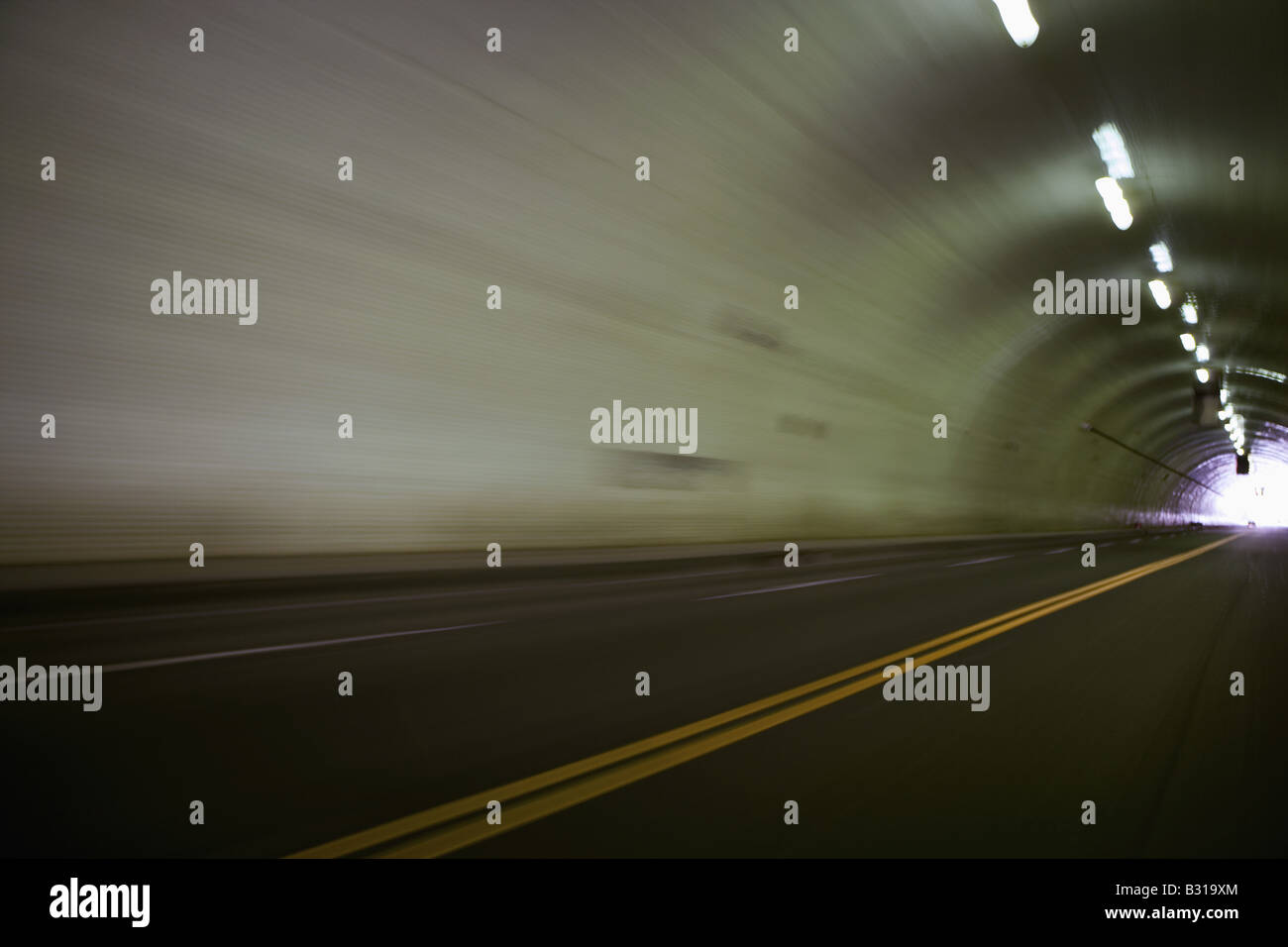 Traffic driving through tunnel Stock Photo Alamy