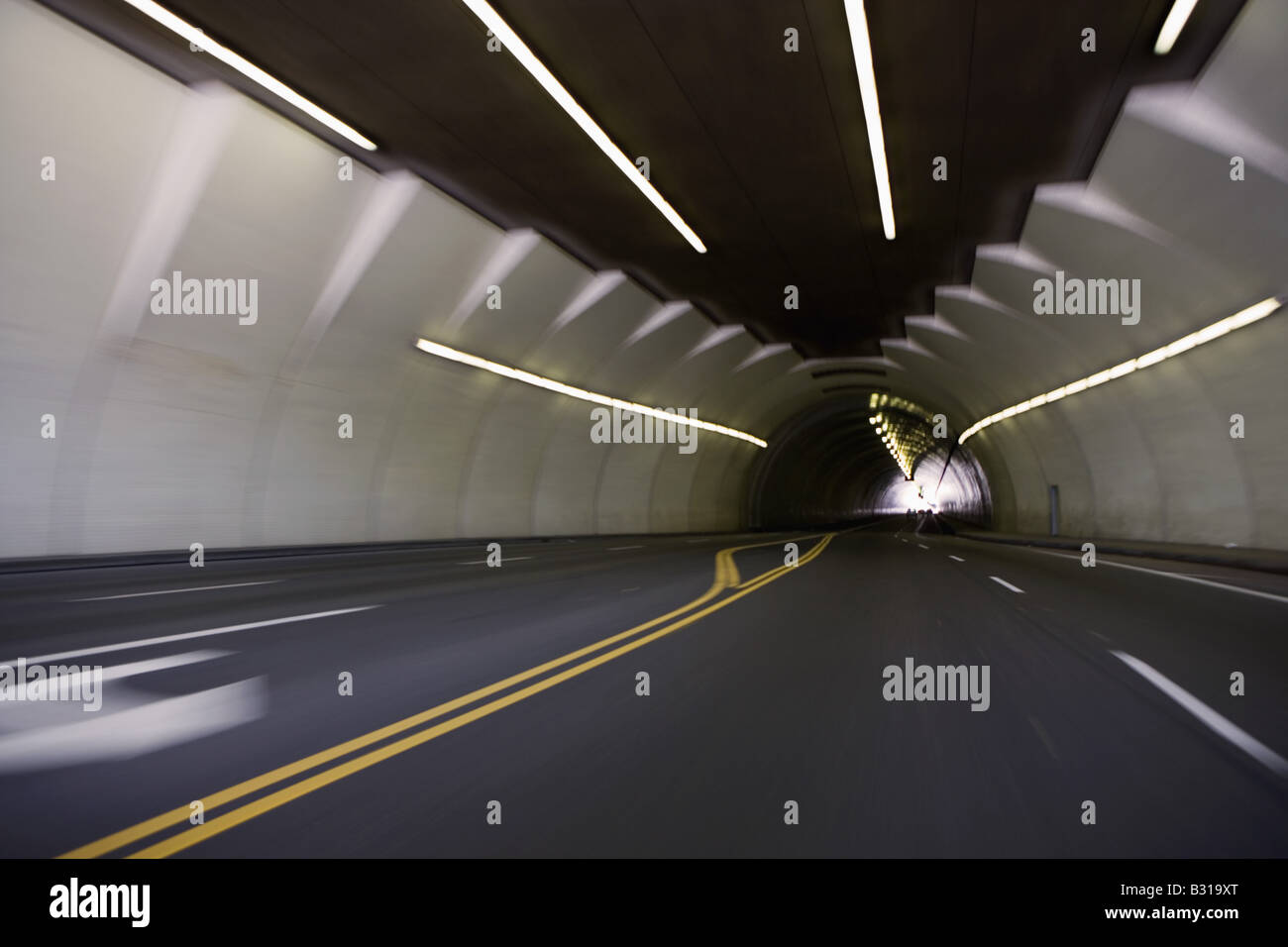 Traffic driving through tunnel Stock Photo Alamy