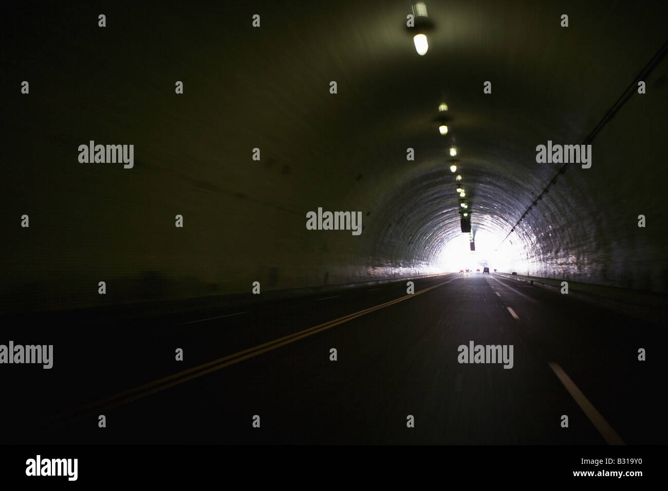 Traffic driving through tunnel Stock Photo Alamy