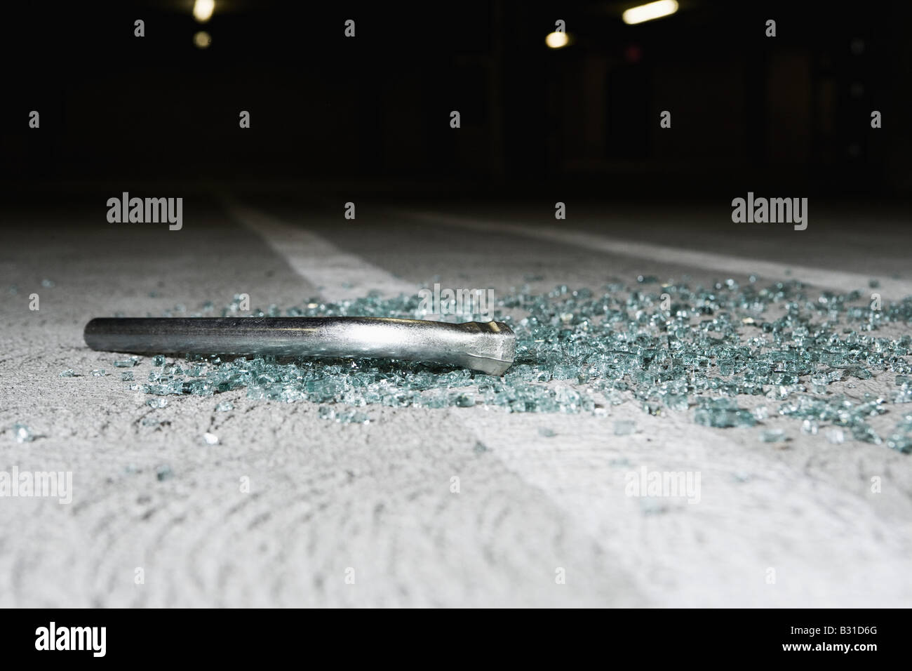 Crowbar and broken glass in car park Stock Photo Alamy