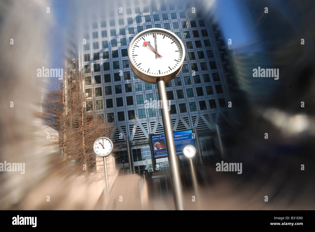 Clocks on Canary Wharf Piazza Stock Photo Alamy