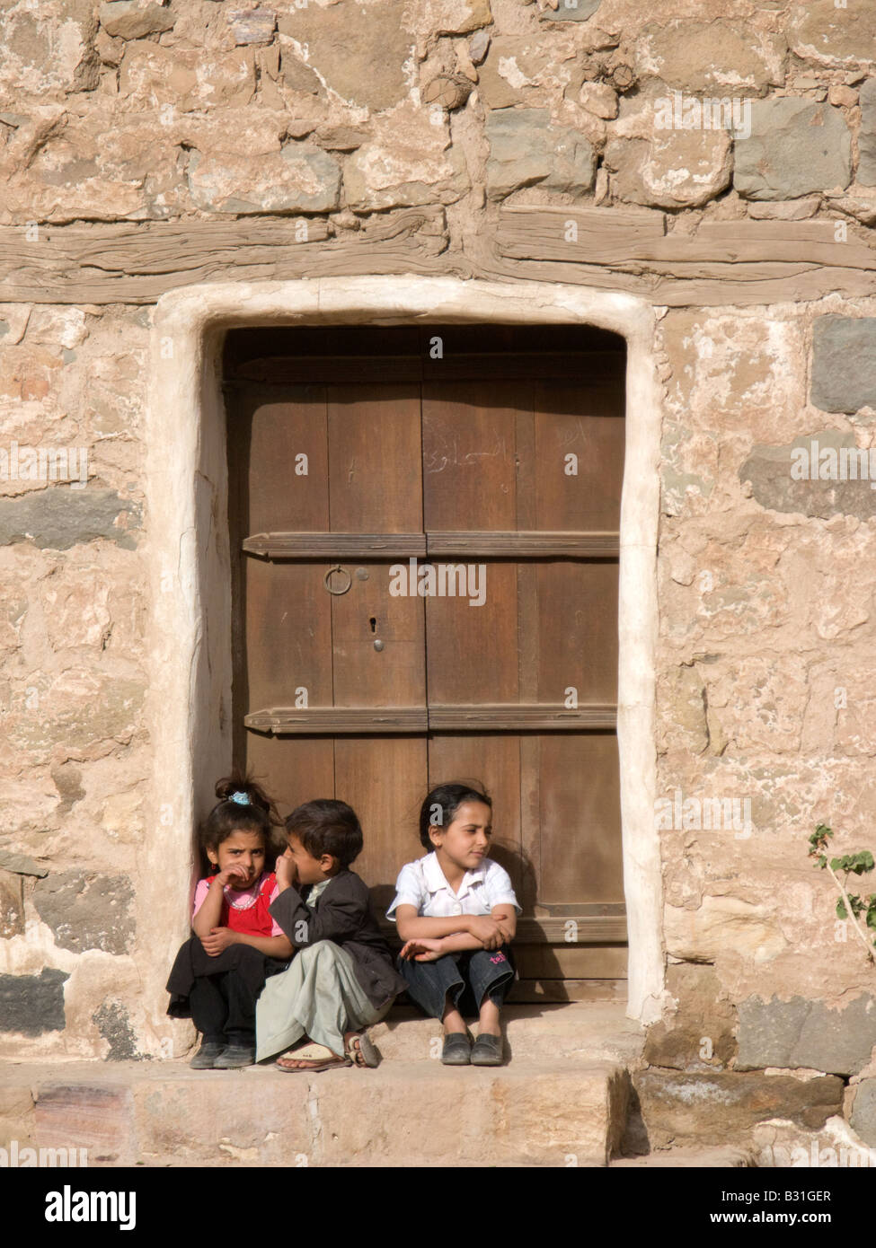 Arab children outside their home near Sanaa, Yemen, Middle East Stock Photo