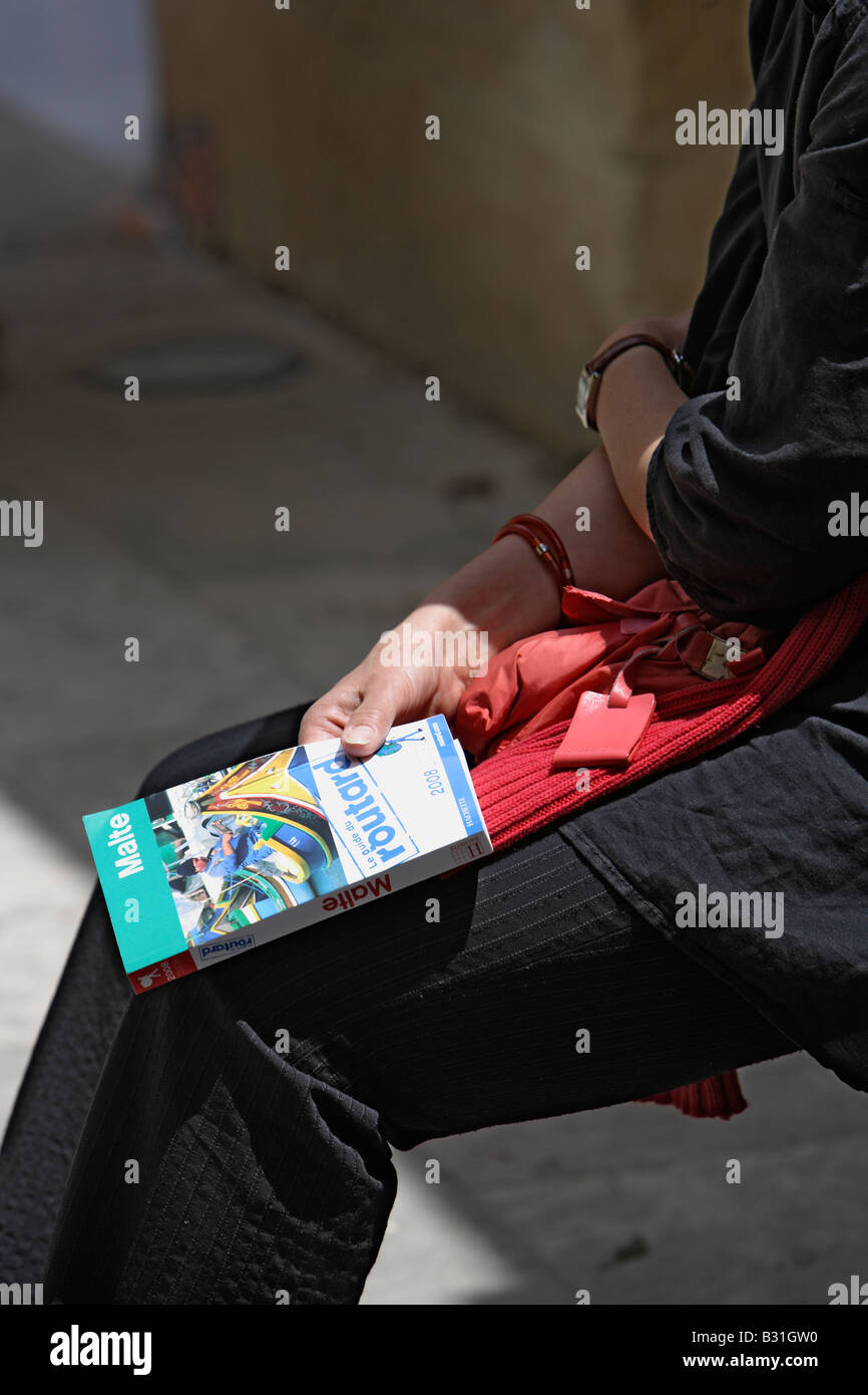 Tourist with Malta Guide Book Stock Photo Alamy