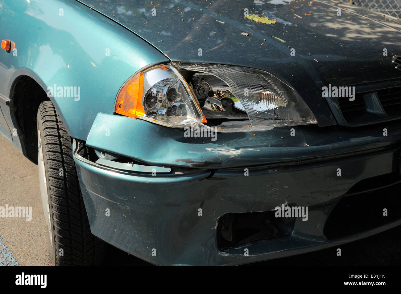 a damaged front of a car Stock Photo