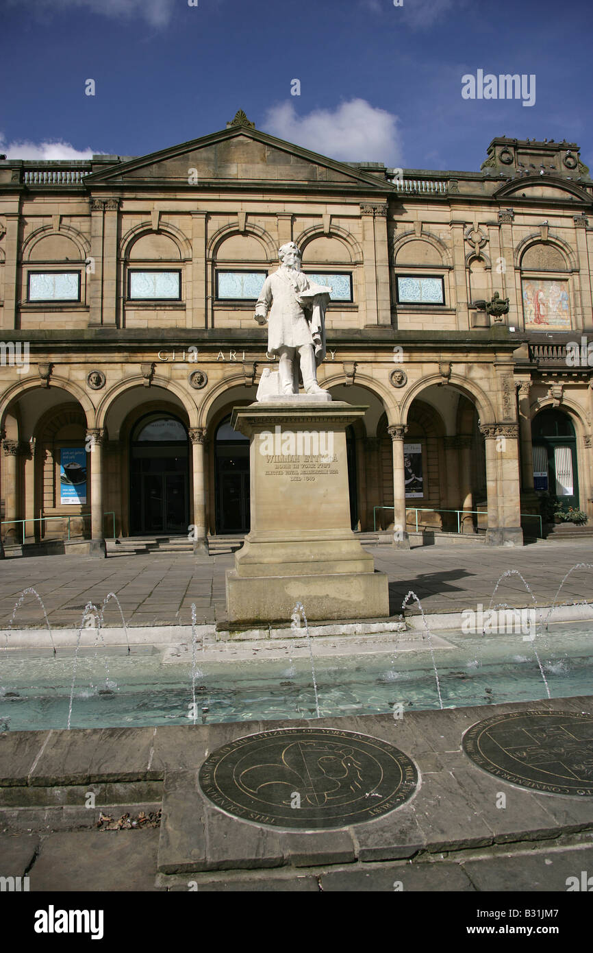 City of York, England. Statue of the artist William Etty at Exhibition Square with the public art gallery in the background. Stock Photo