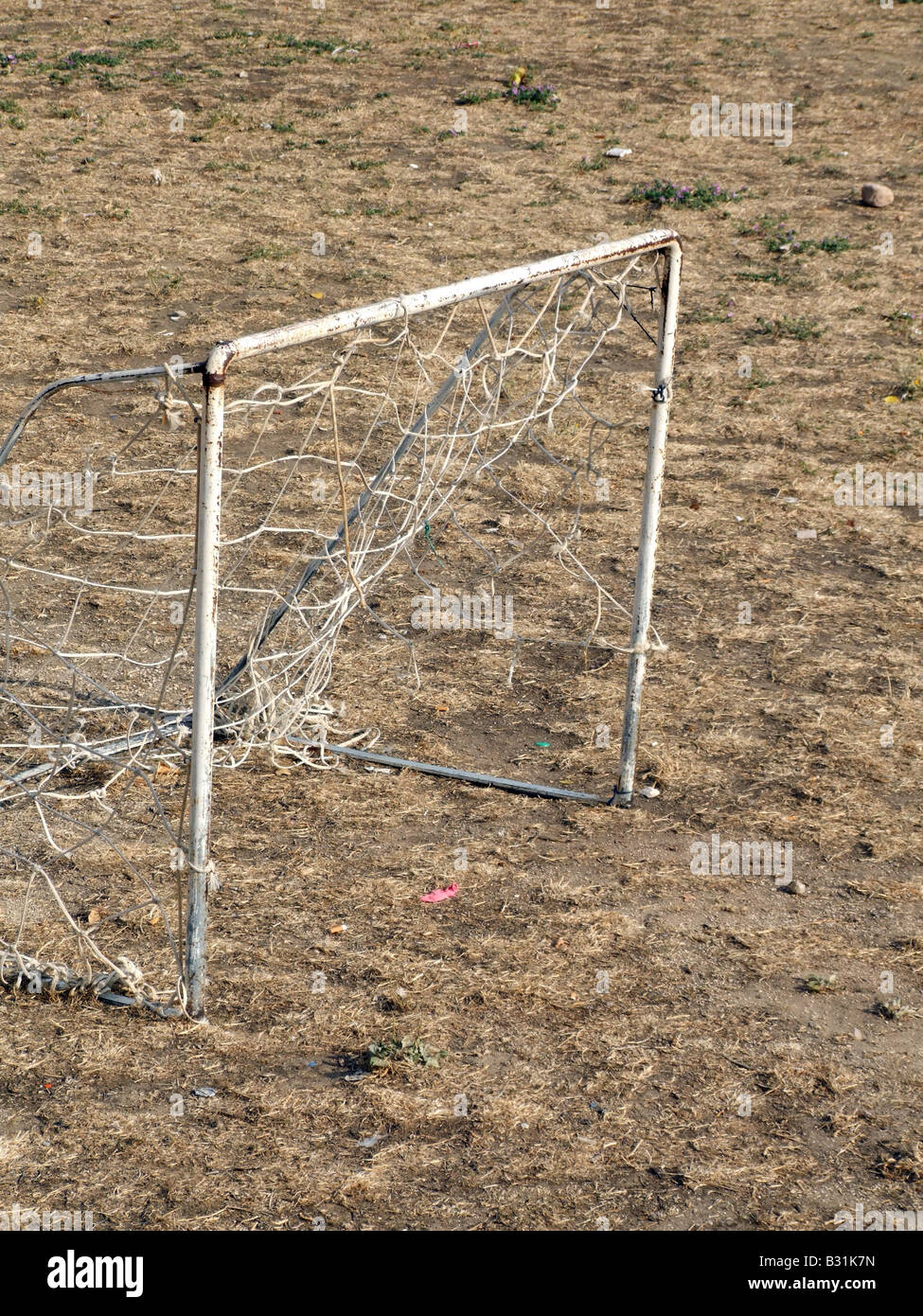 Playing soccer in desert dust beneath the Rifa-Fort, Rifa, Kingdom