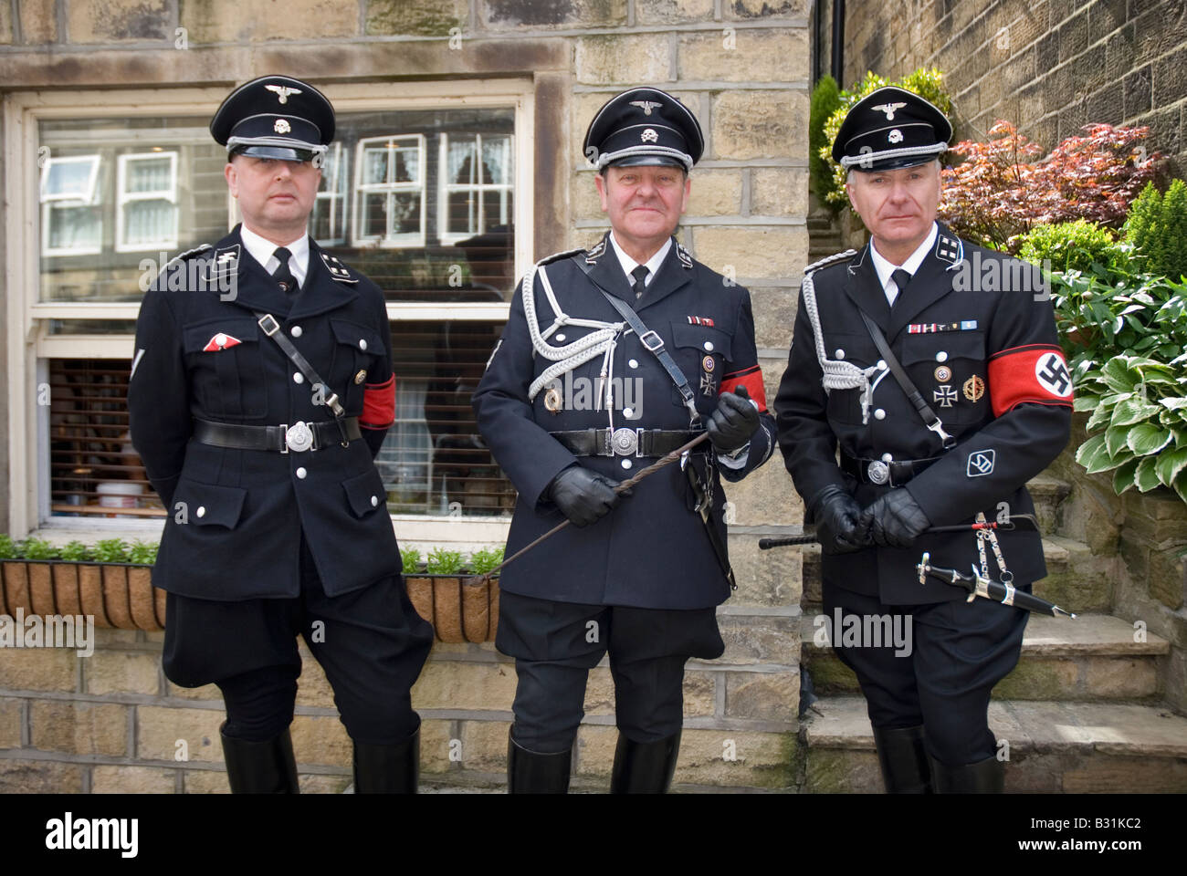 Three men wearing Nazi uniforms as part of the Haworth 1940 s weekend 2008 Stock Photo