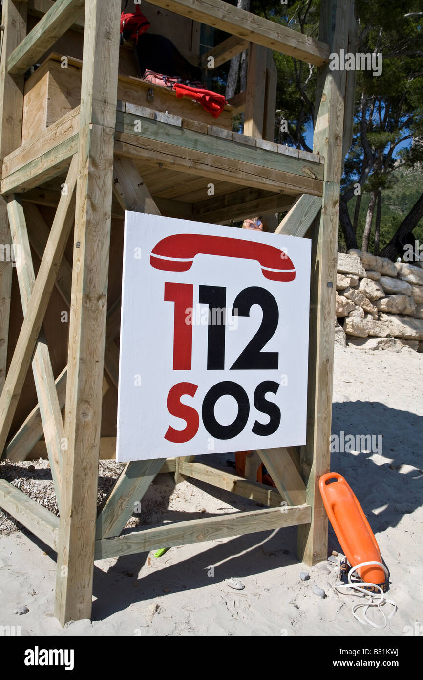 SOS Sign on a lifeguards tower on a beach Stock Photo