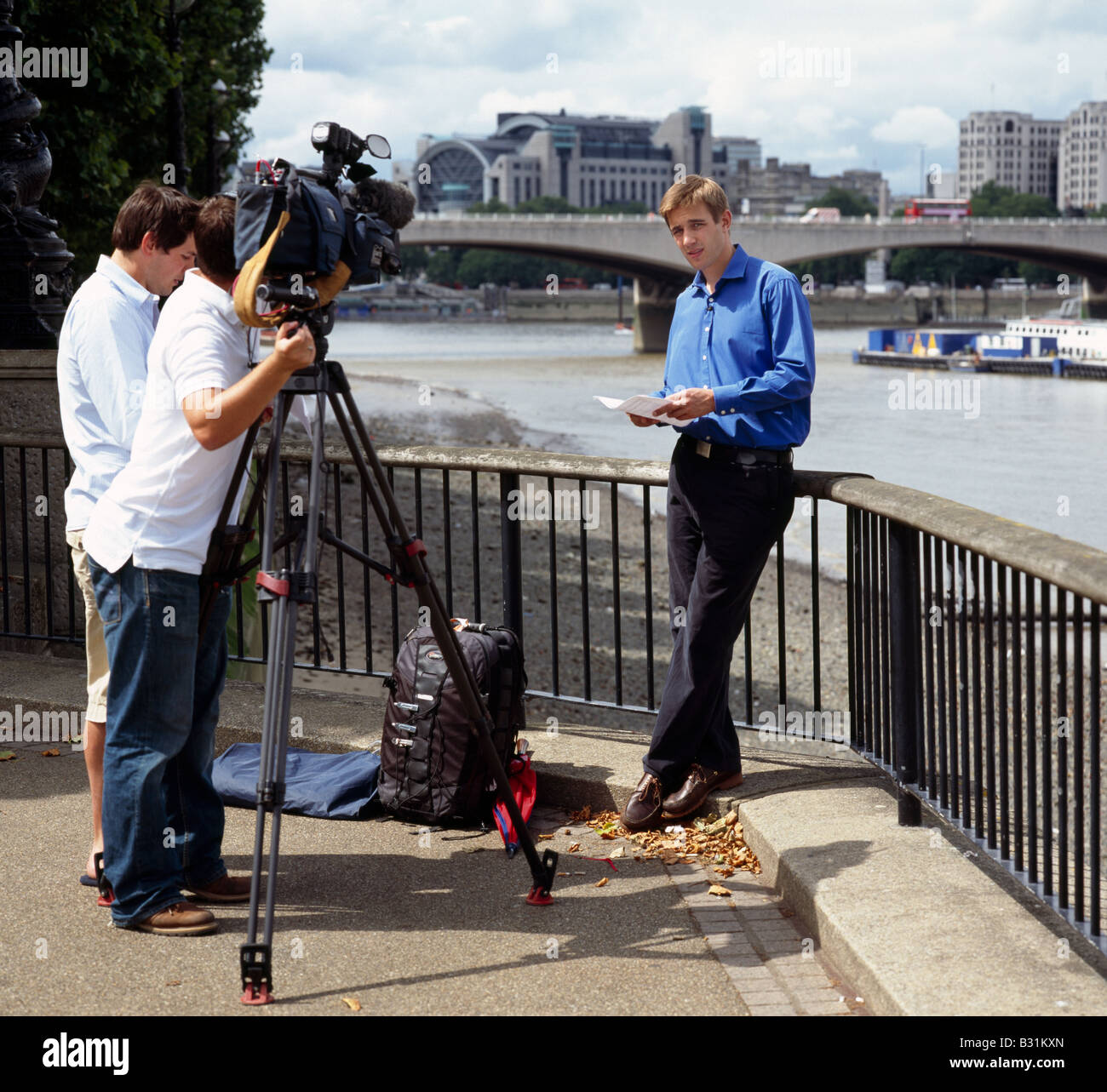 TV crew and reporter. South Bank, London, England, UK. Stock Photo