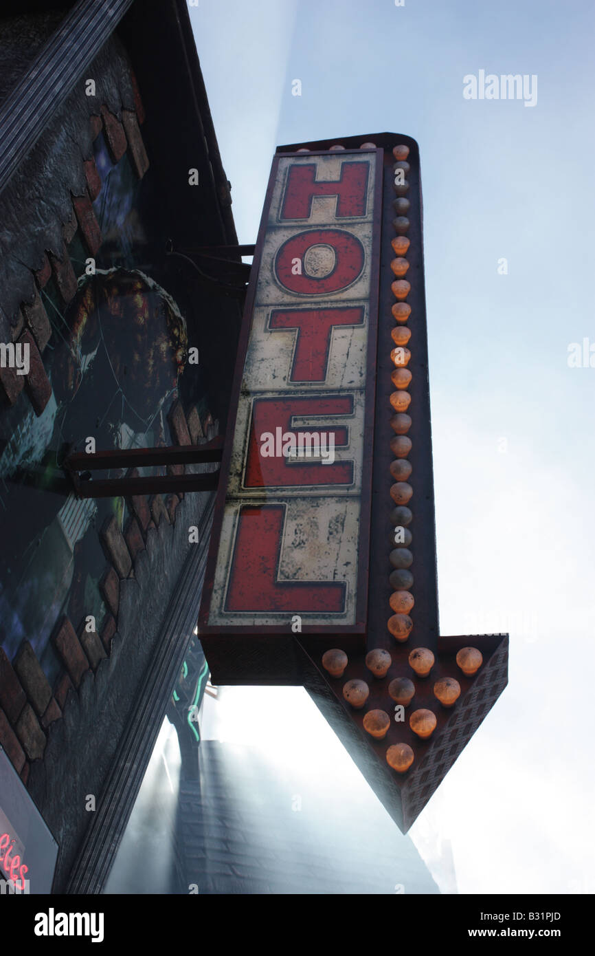 SIGN ON THE OUTSIDE OF A RUNDOWN HOTEL VERTICAL BDB11273 Stock Photo