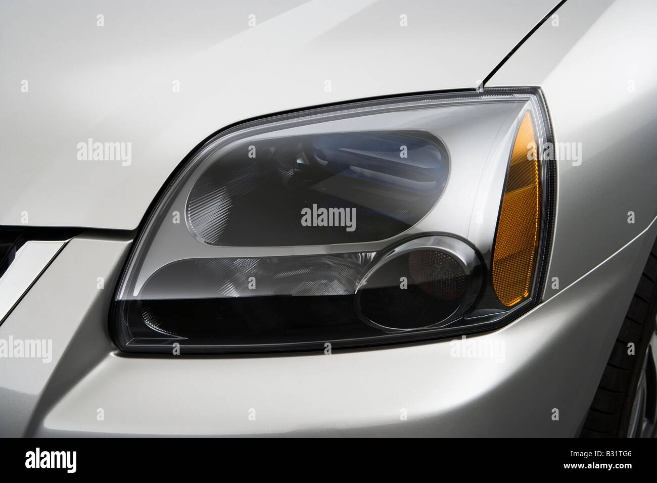 2009 Mitsubishi Galant Ralliart in Silver - Headlight Stock Photo
