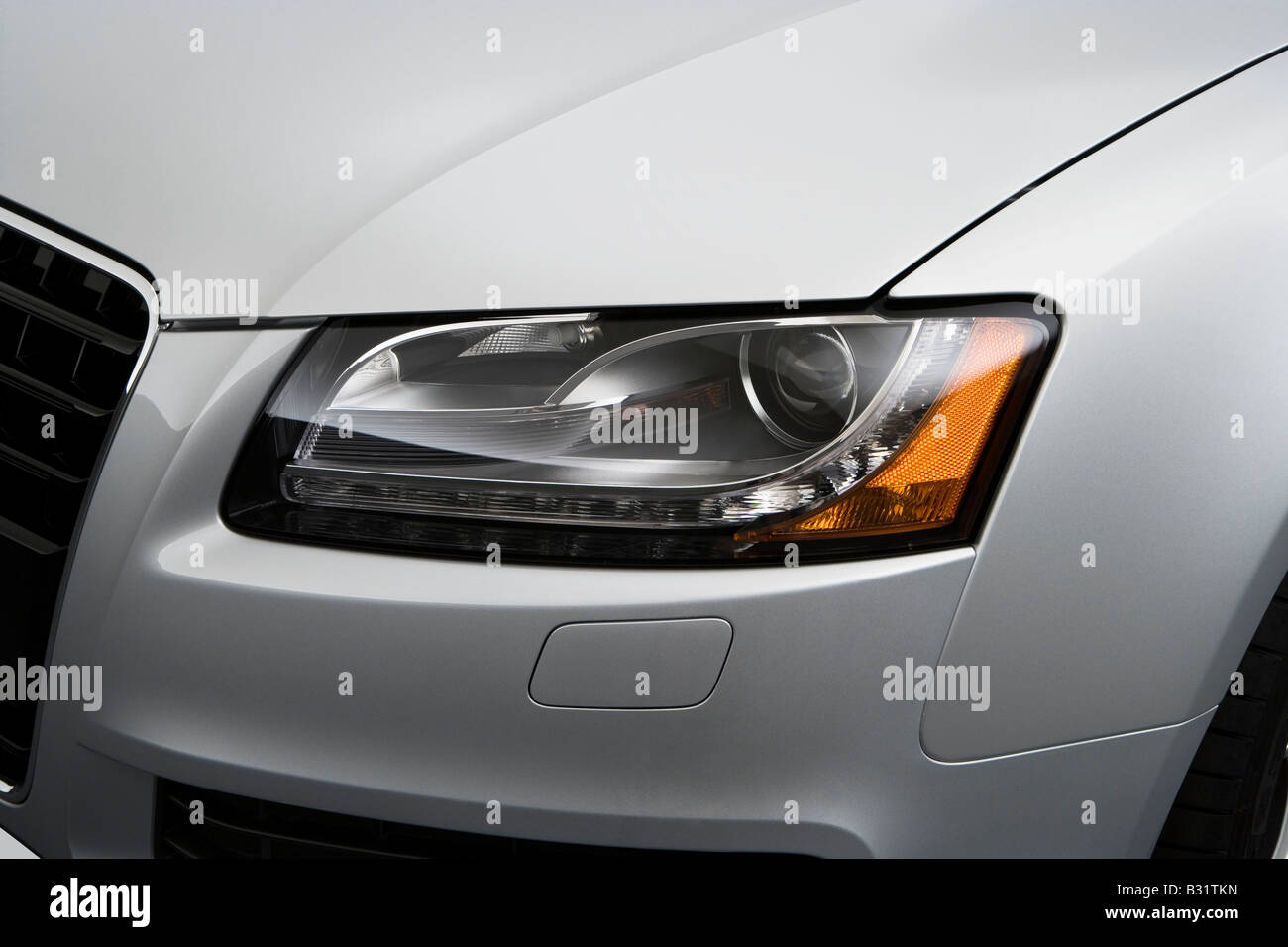 2008 Audi A5 3.2 quattro in Silver - Headlight Stock Photo