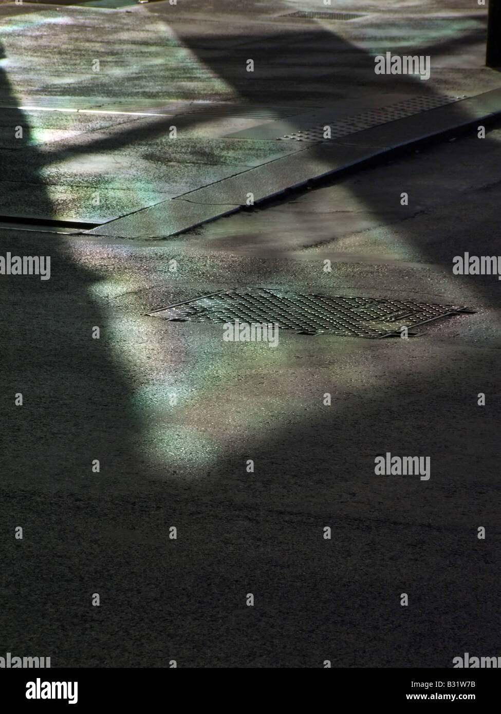 abstract dark shadow light on road surface in town Stock Photo