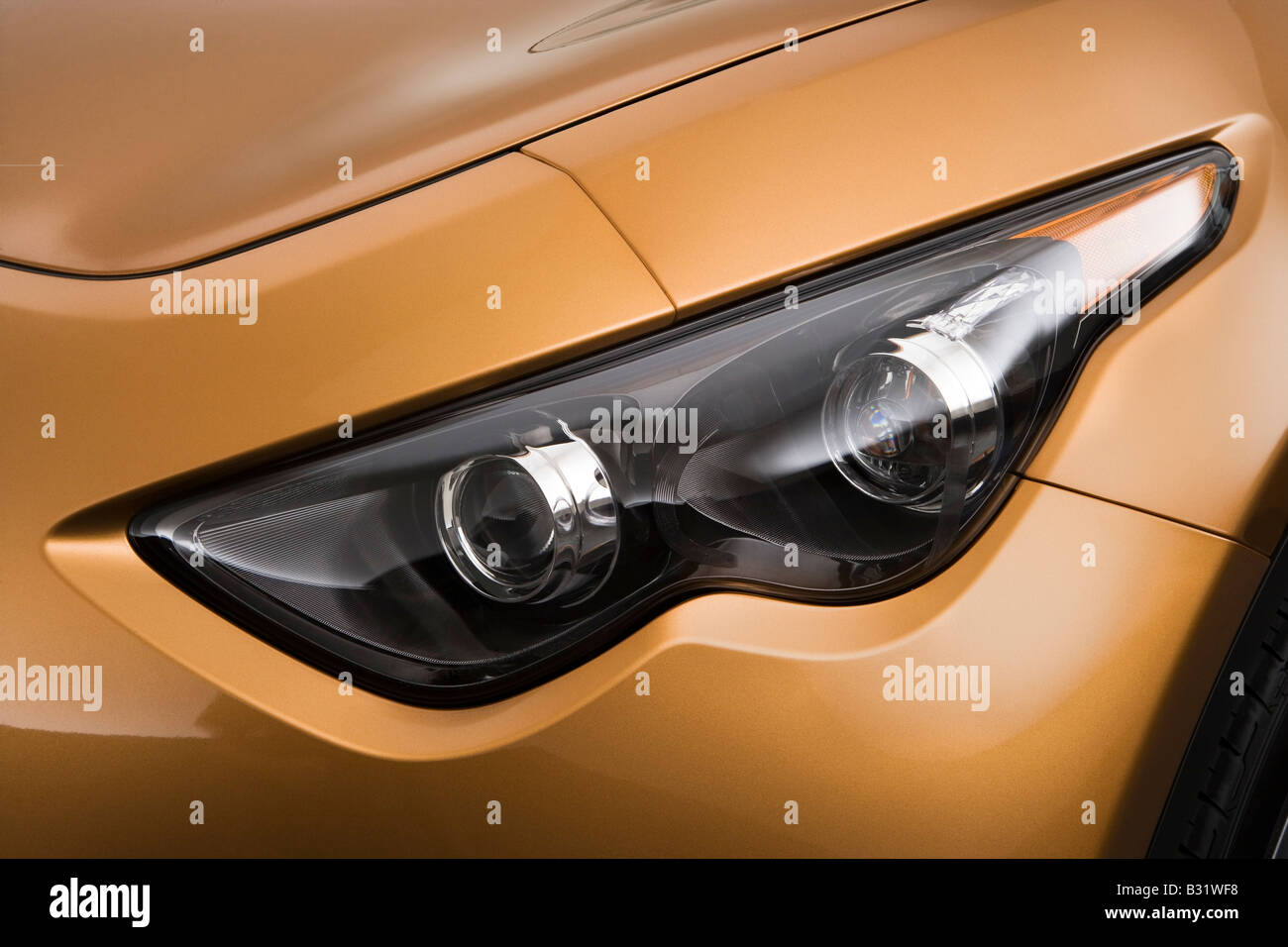 2009 Infiniti FX FX50 Sport in Orange - Headlight Stock Photo