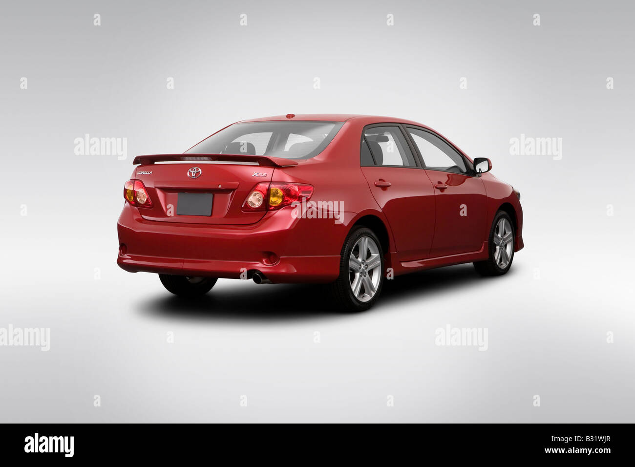09 Toyota Corolla Xrs In Red Rear Angle View Stock Photo Alamy