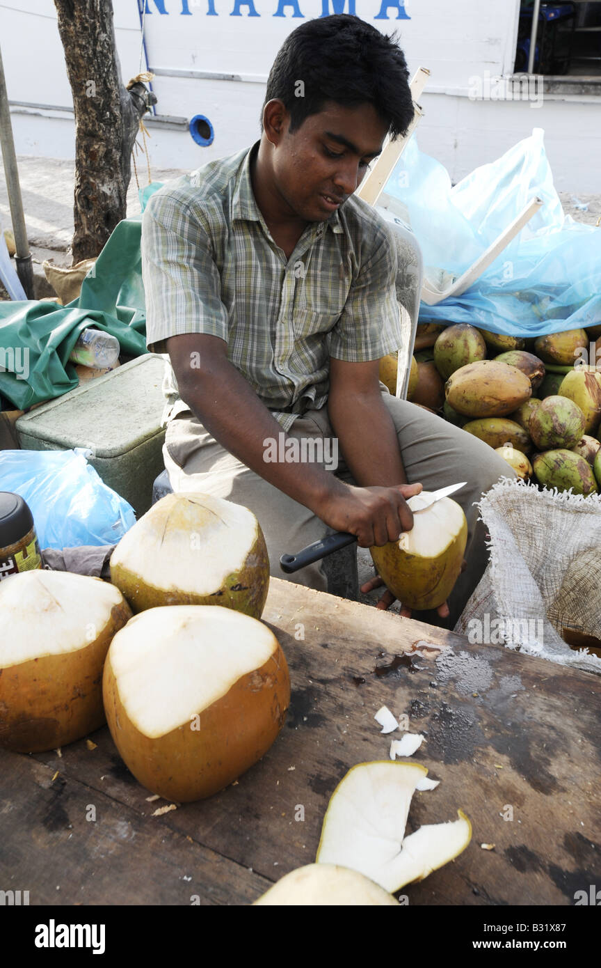 coconut cutting Stock Photo