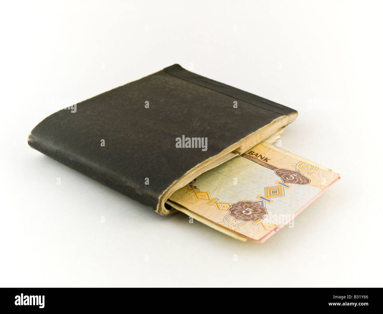 Old Chequebook and Five Dirham Note on White Background Stock Photo