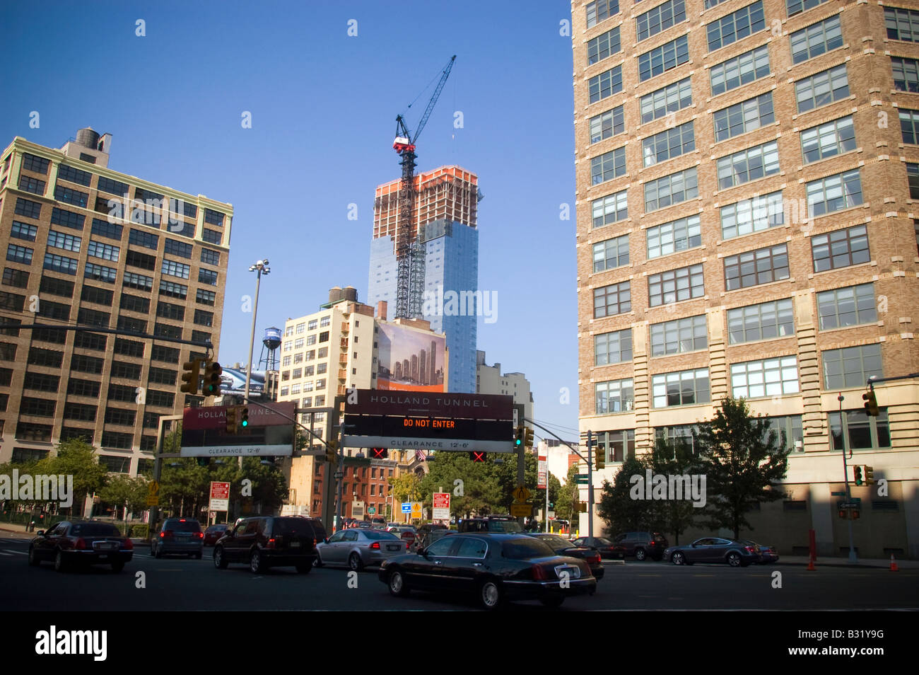 The Trump Soho Hotel Condominium on Spring Street is seen from the entrance to the Holland Tunnel in New York Stock Photo