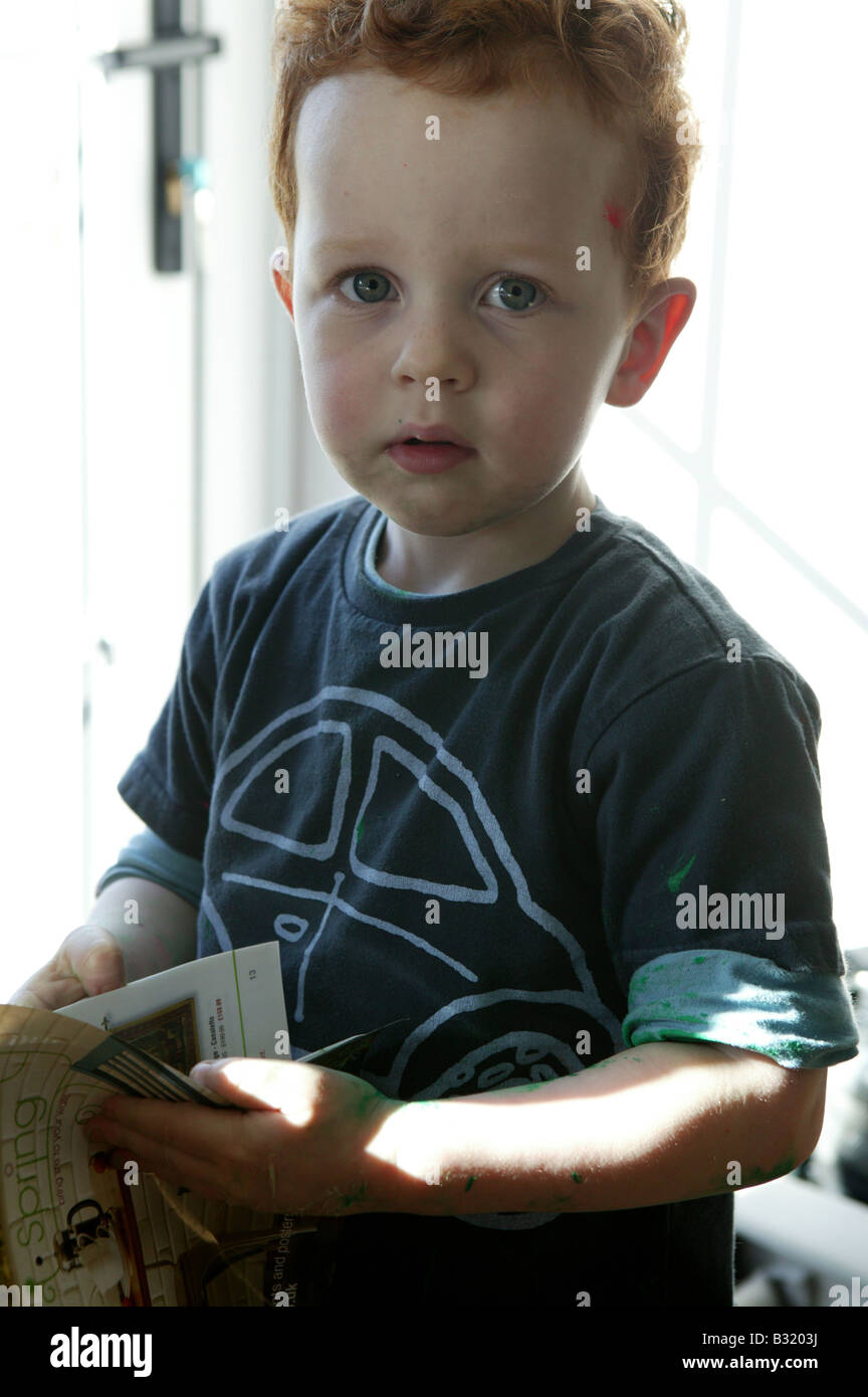 Small Male Child With Ginger Or Red Hair Sitting Hoding Newspaper With Bright Background Sweet Innocent Portait Image Stock Photo Alamy Small Male Child With Ginger Or Red Hair Sitting Hoding Newspaper With Bright Background Sweet Innocent Portait Image Stock Photo Alamy