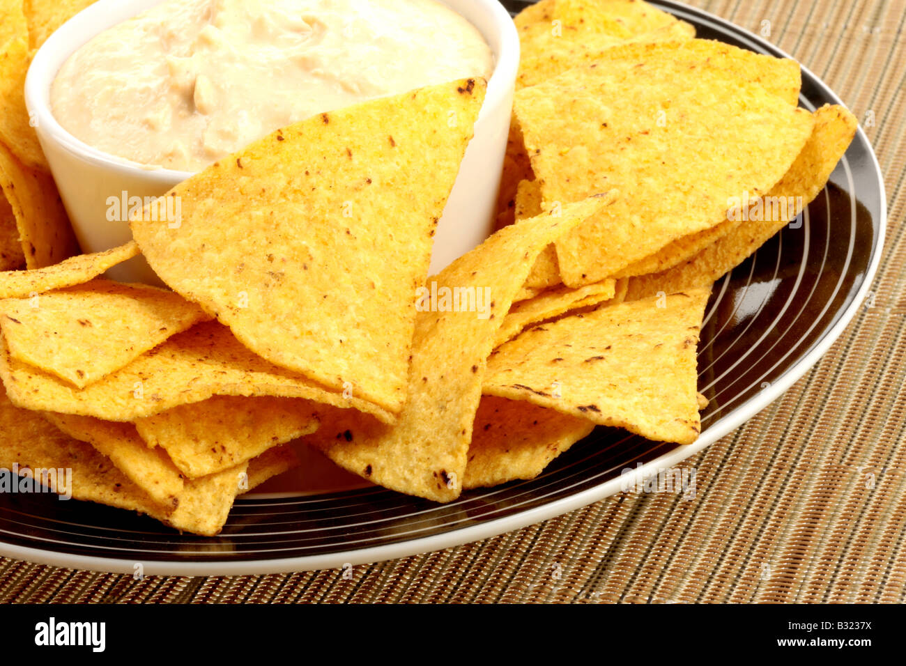 Tortilla Chips with Hummus Stock Photo Alamy