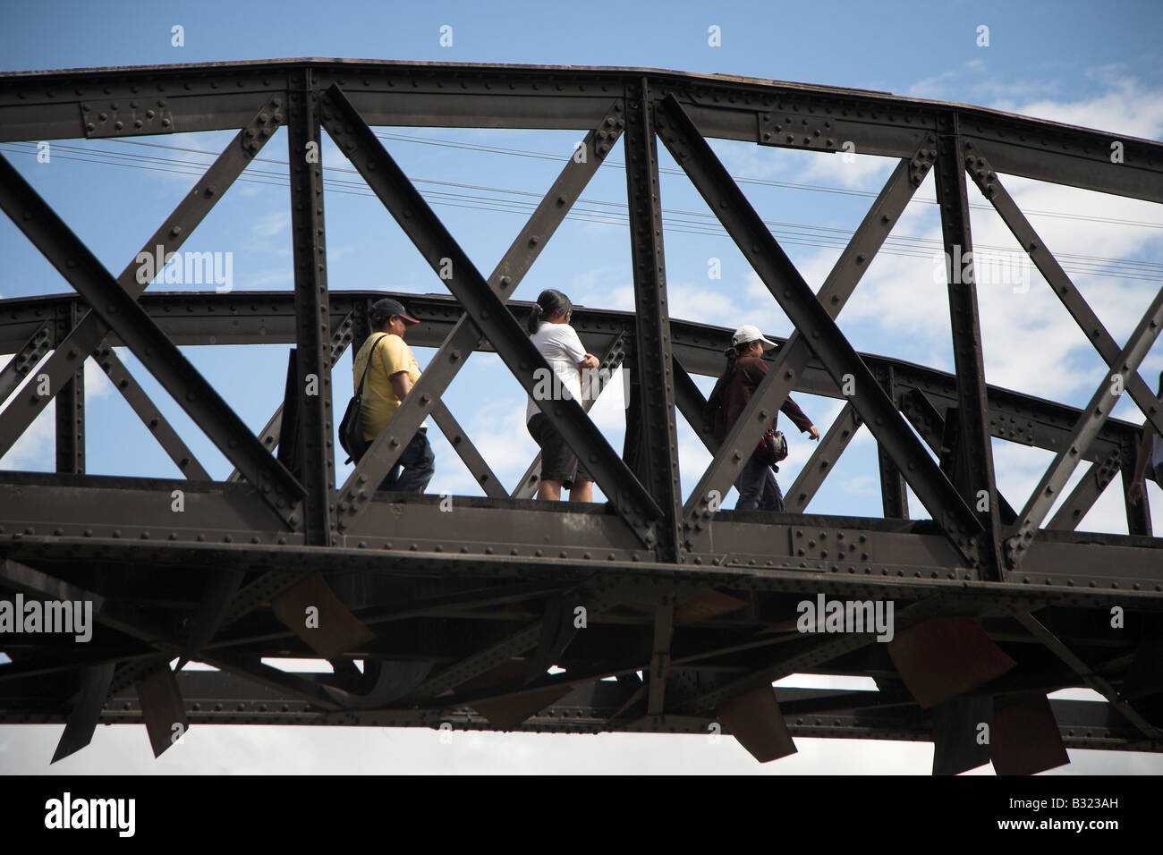 The famous bridge over the River Kwai in Kanchanaburi in Thailand. Stock Photo