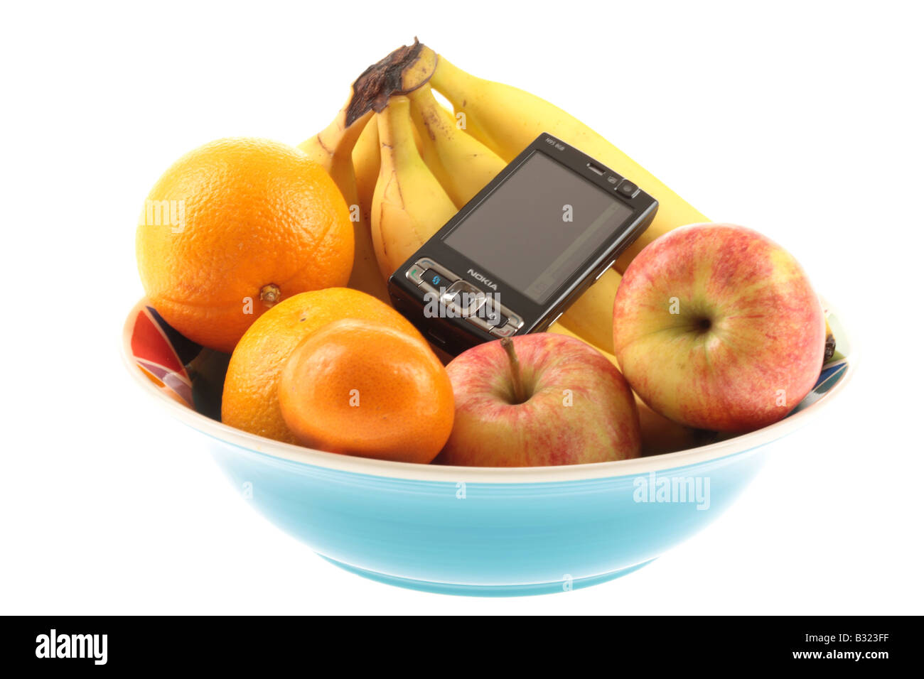 Mobile Phone in a Fruit Bowl Stock Photo