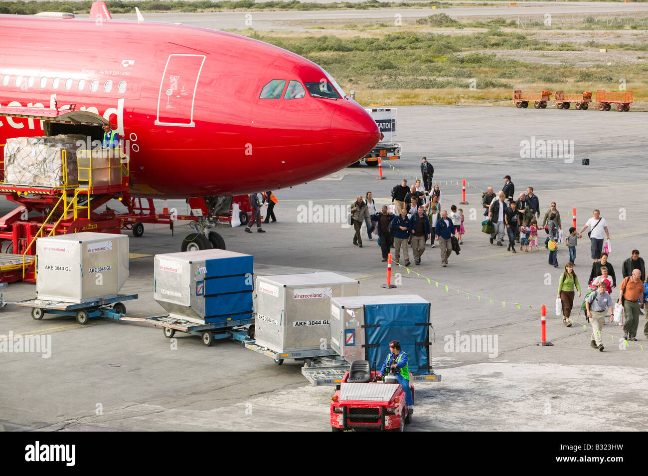 An air Greenland flight at Kangerlussuaq airport bringing freight and tourists to Greenland Stock Photo
