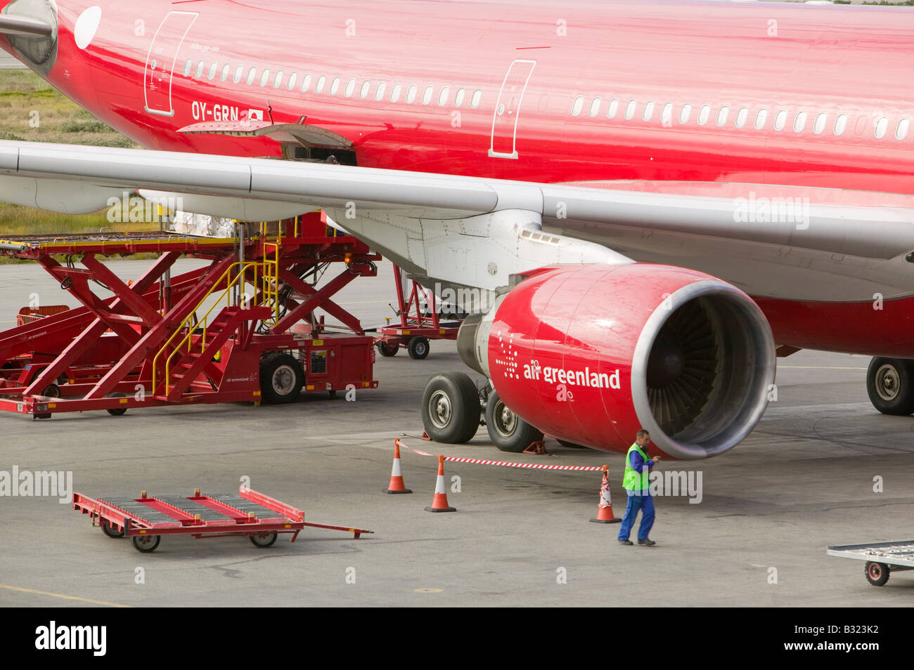 An air Greenland flight at Kangerlussuaq airport bringing freight and tourists to Greenland Stock Photo