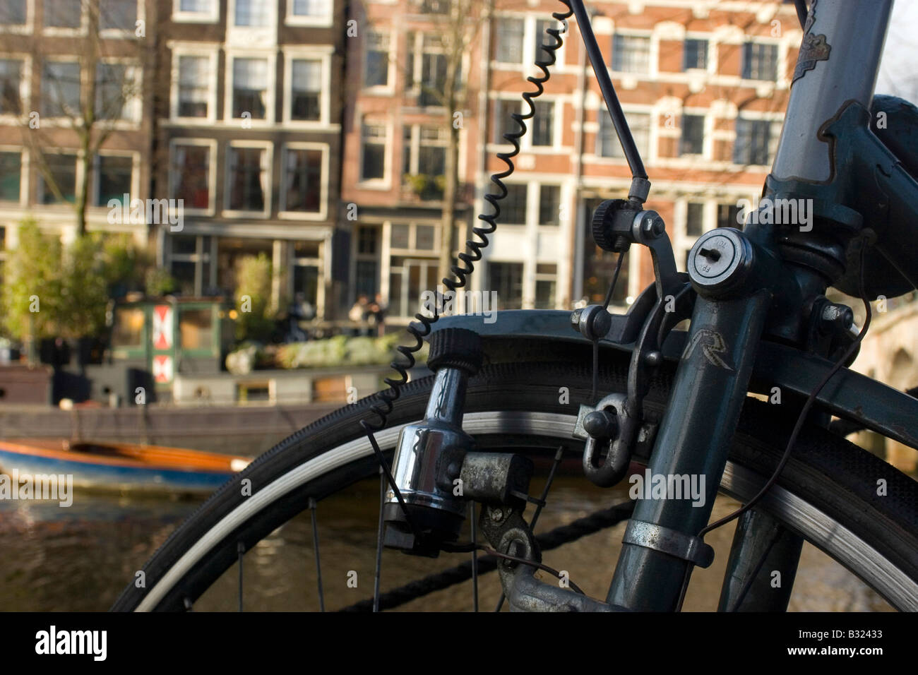 Bicycle beside the canal, Amsterdam Stock Photo