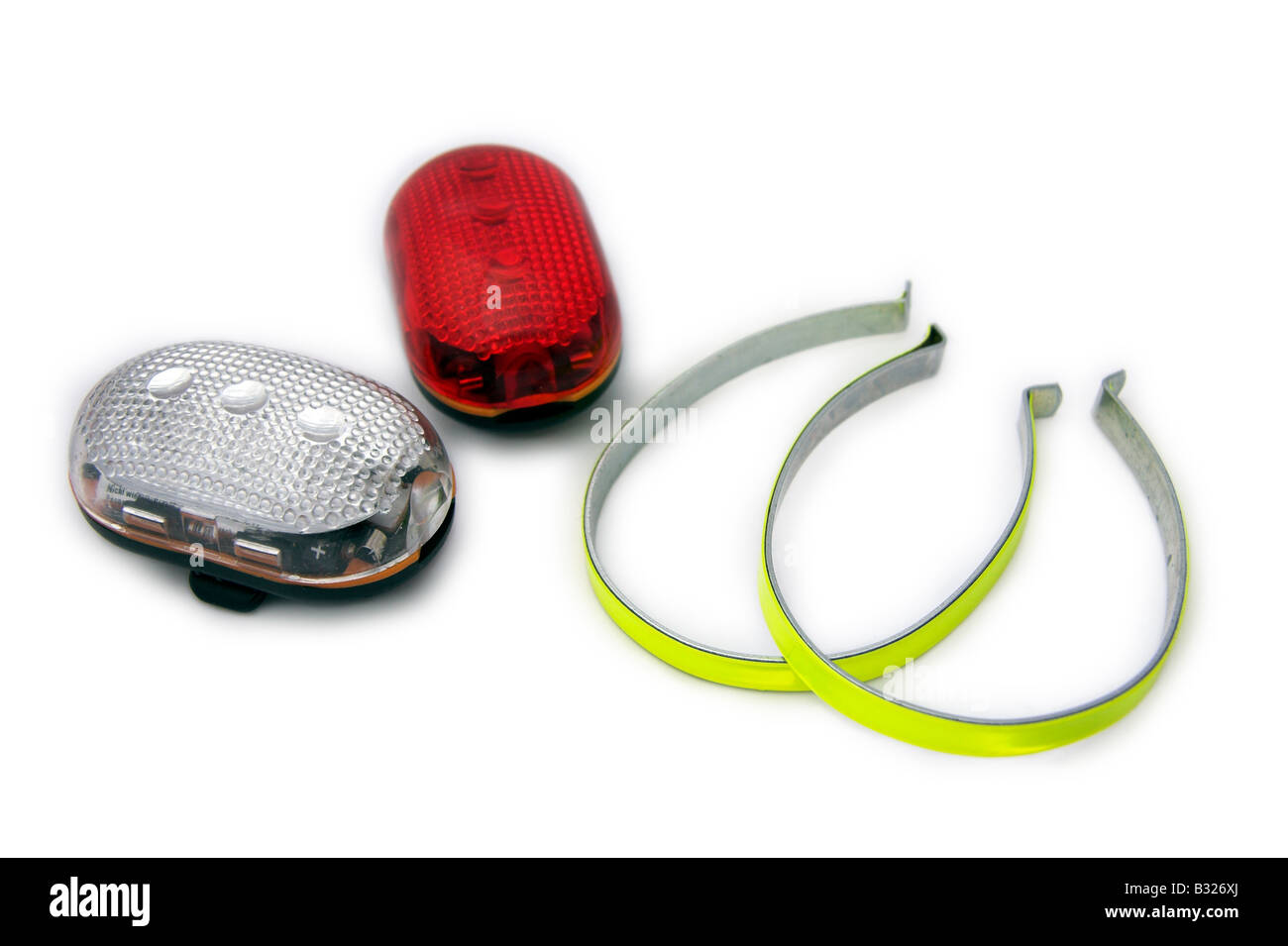 Bicycle lights and trouser clips, white background Stock Photo Alamy