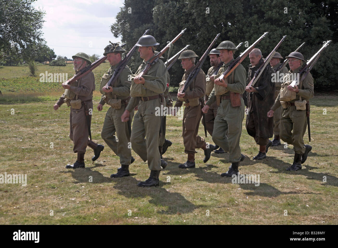 Home Guard soldiers marching in uniform during 1940s second world war ...