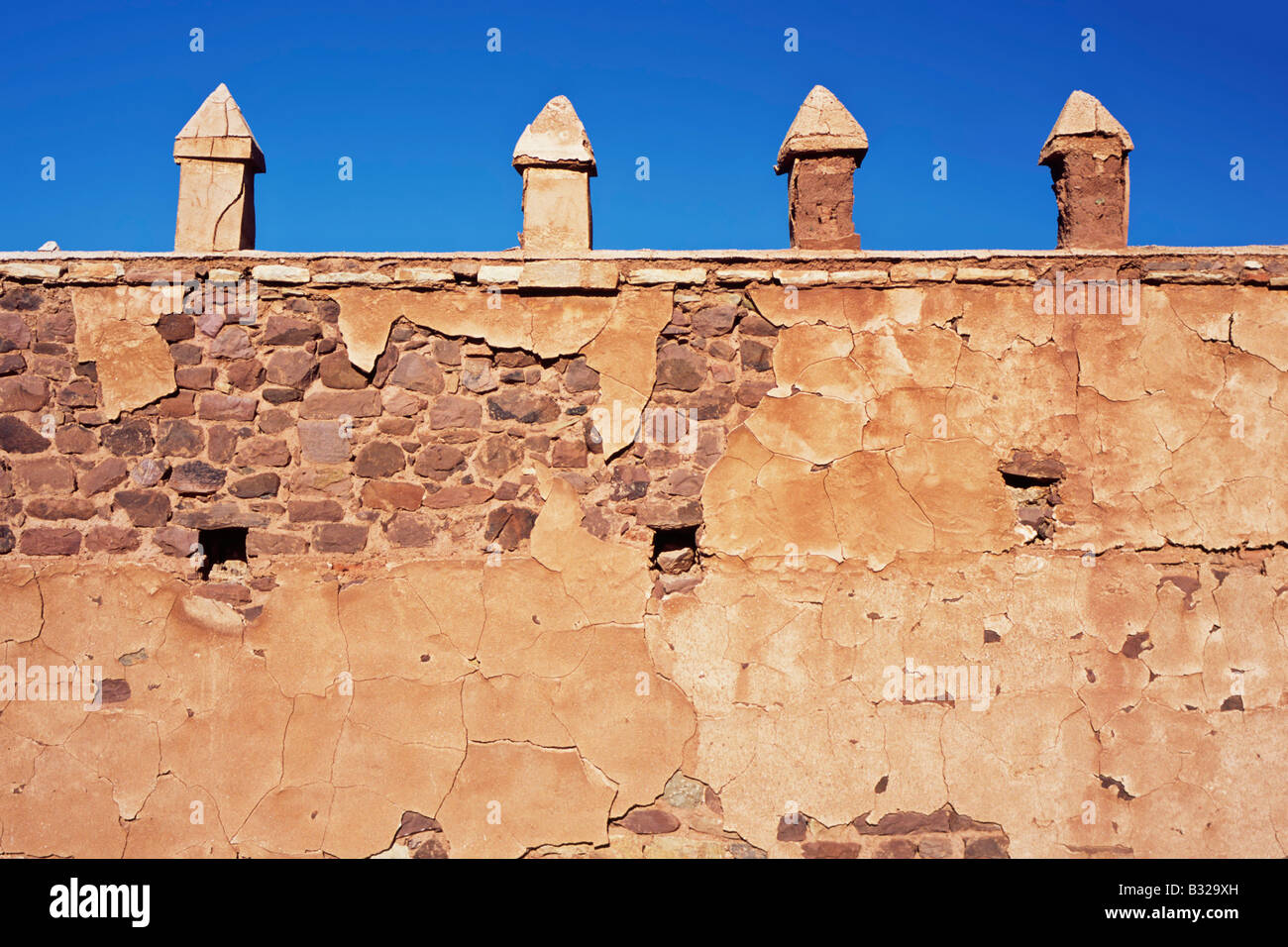 Crenellation along the outer wall of the kasbah at Telouet in Morocco, North Africa Stock Photo
