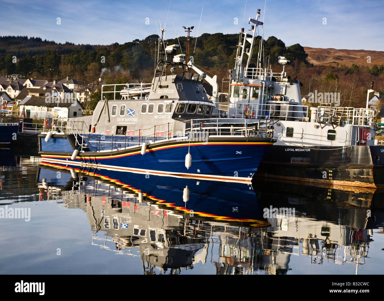 Ships moored in the Corpach Basin on the Caledonian Canal at Corpach near Fort William, Scotland. Stock Photo
