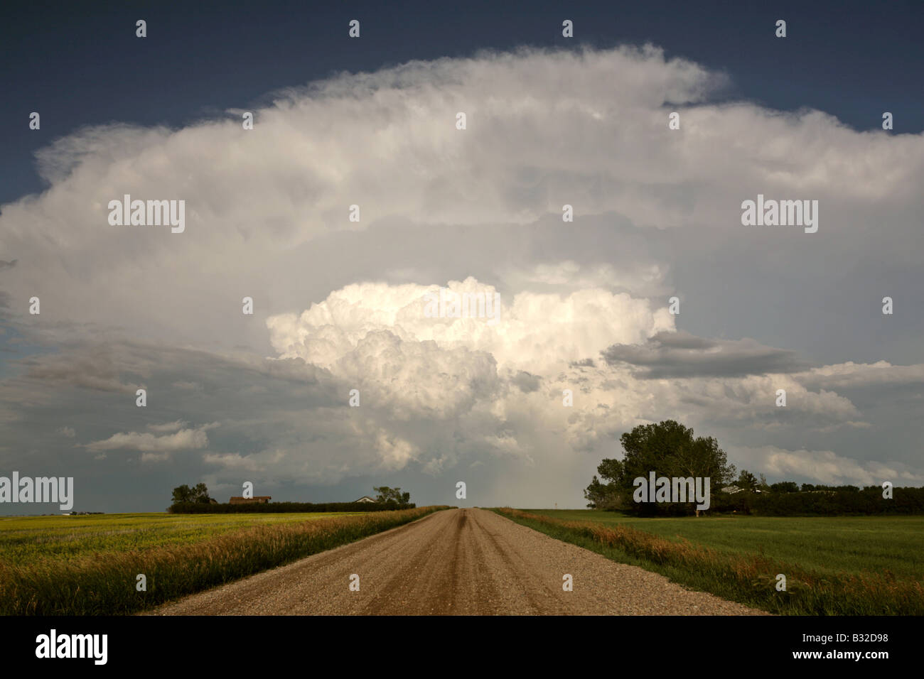 Storm clouds down Saskatchewan country road Stock Photo - Alamy